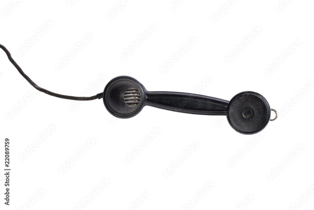 Antique telephone receiver with a cord (isolated on white) Antique telephone receiver with a cord (isolated on white)
