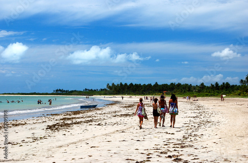 women walking on the beach in Alagoas, Brazil