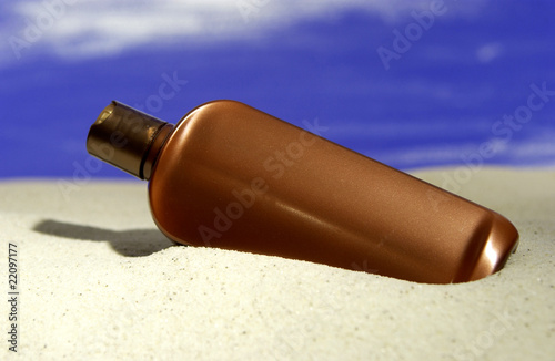 Suntan lotion on beach