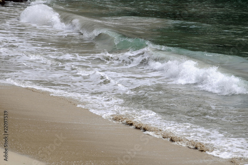 Wellen am Sandstrand