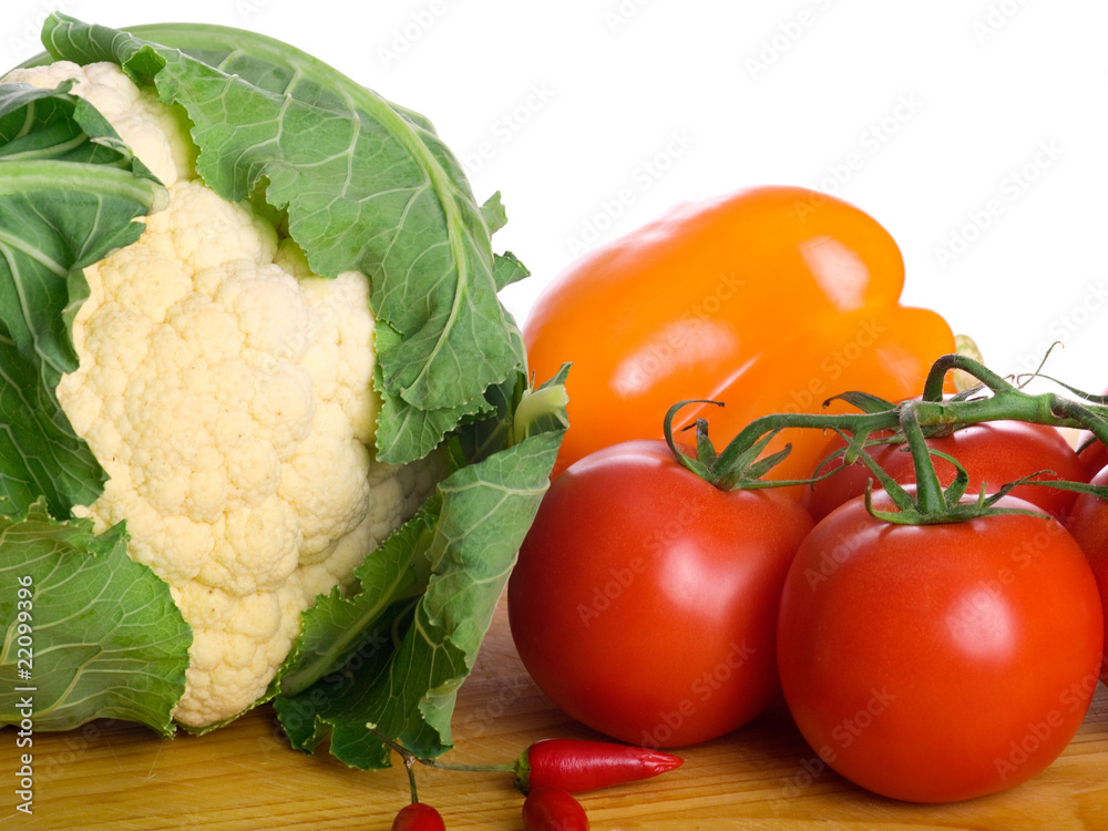 Fresh and bright vegetables on white background. Fresh and bright vegetables on white background.