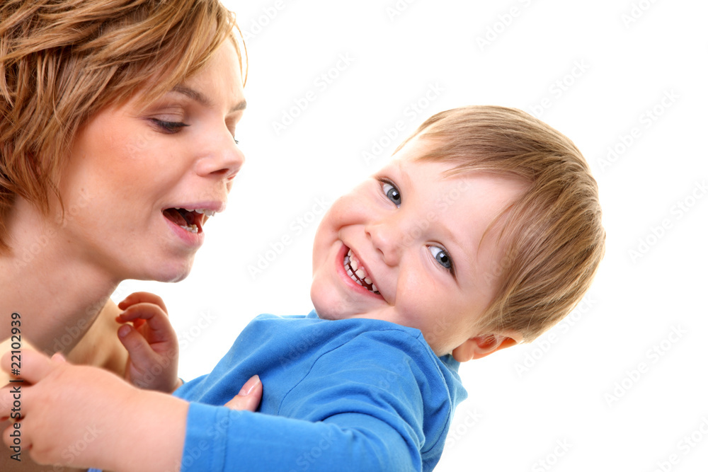 young little son embracing his pretty young mother young little son embracing his pretty young mother