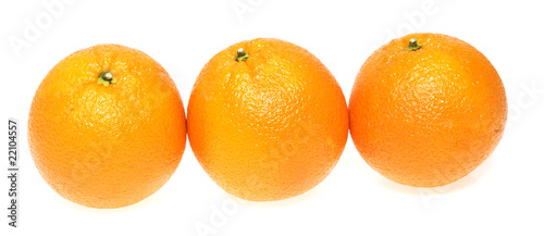 three oranges on white background
