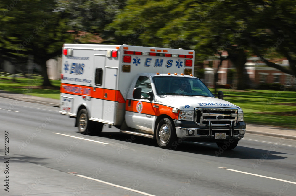 A speeding ambulance, with motion blur - obrazy, fototapety, plakaty 