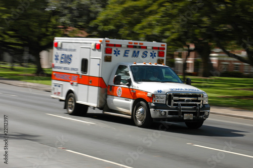 A speeding ambulance, with motion blur photo