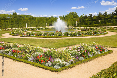 Fountain spraying water in Versailles Chateau gardens  France