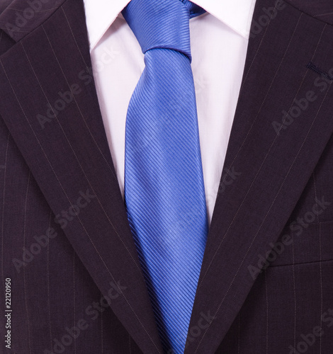 Detail of a Business man Suit with blue tie