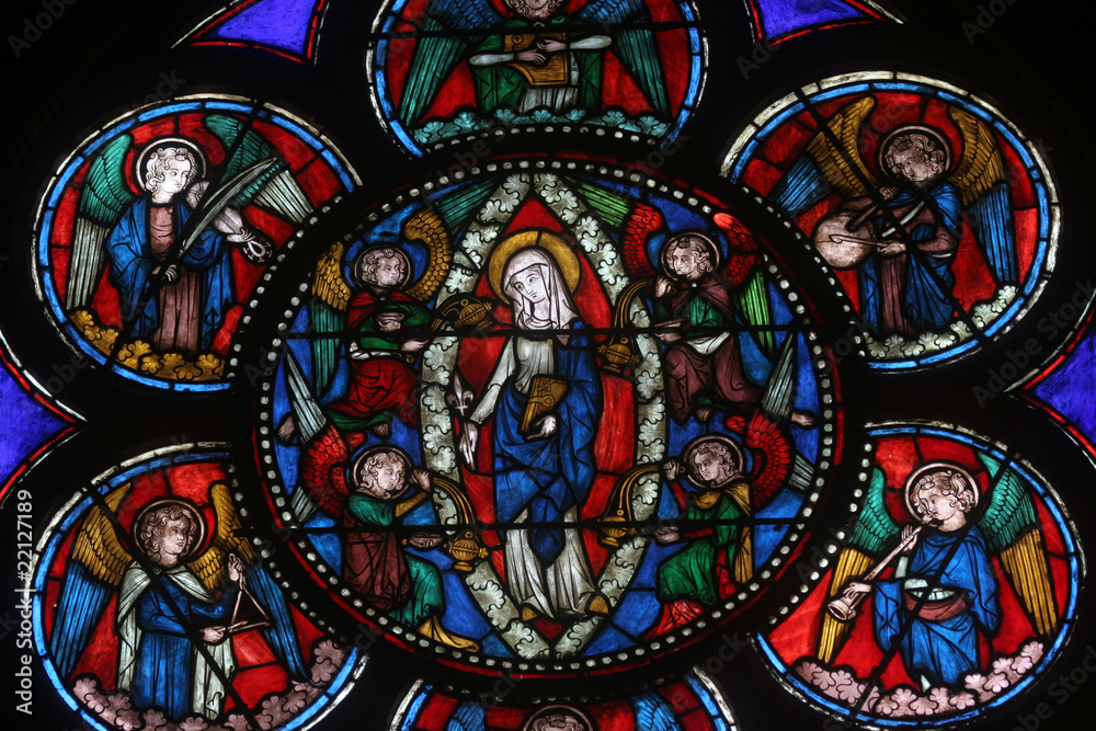 Stained glass window in Cathedral Notre Dame de Paris Stained glass window in Cathedral Notre Dame de Paris