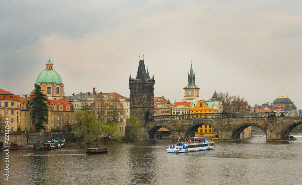 View of Prague with Charles bridge at overcast day