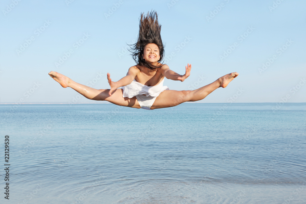 fit active healthy woman jumping