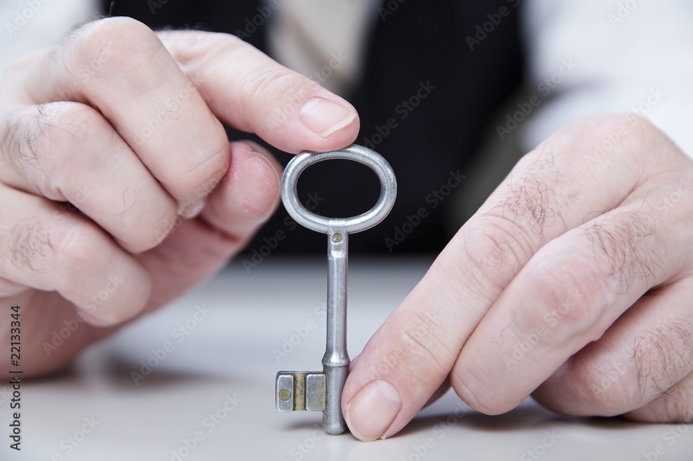 businessman with key of success businessman with key of success