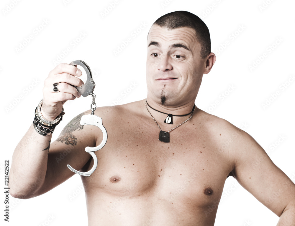 jeune homme libre de ses menottes StockFoto Adobe Stock