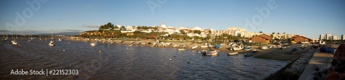 Panorama of a beach with fishing boats in Alvor