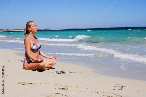 Young beautiful girl on the beach