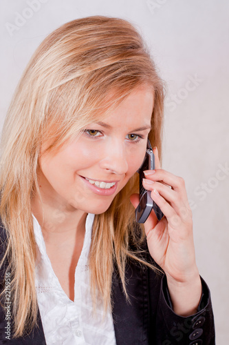 Business woman with mobile phone