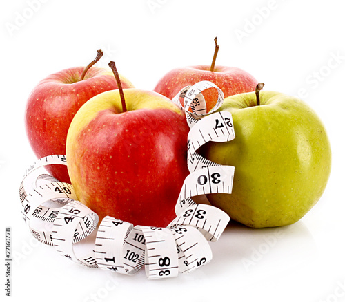 Apples and a measure tape, diet concept