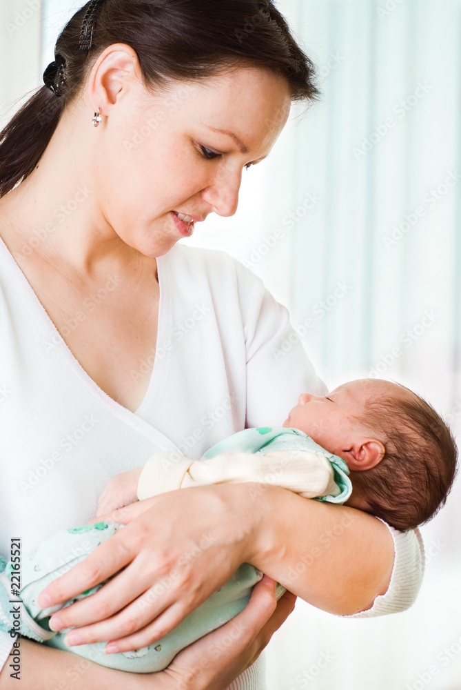 mother holds the baby mother holds the baby