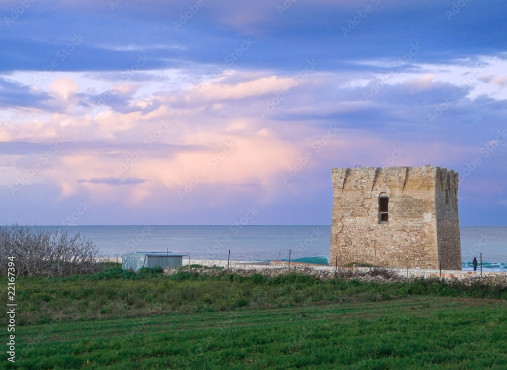 Abandoned tower at sunset.