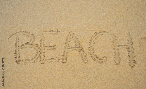 Beach escrito en la arena