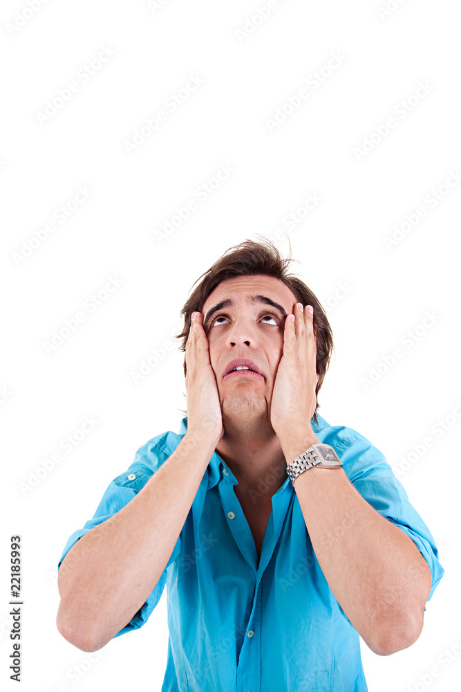 Strongly afflicted young man, with hands on face Strongly afflicted young man, with hands on face