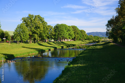 River on blue sky photo