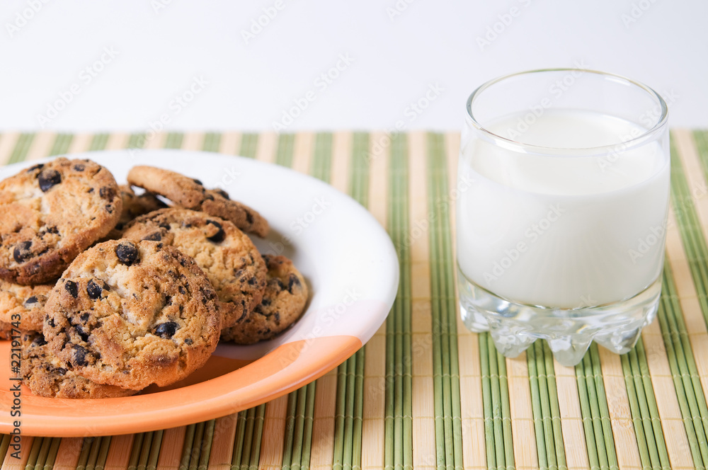Glass of milk and chocolate cookies Glass of milk and chocolate cookies