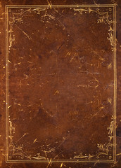 old leather background with golden floral decoration