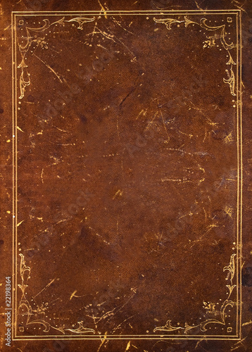 old leather background with golden floral decoration