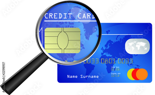 carte de credit et loupe