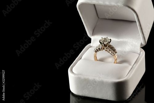 Diamond ring in white ring box