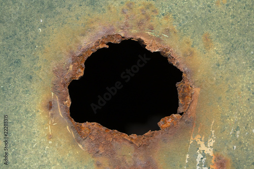 rusted hole