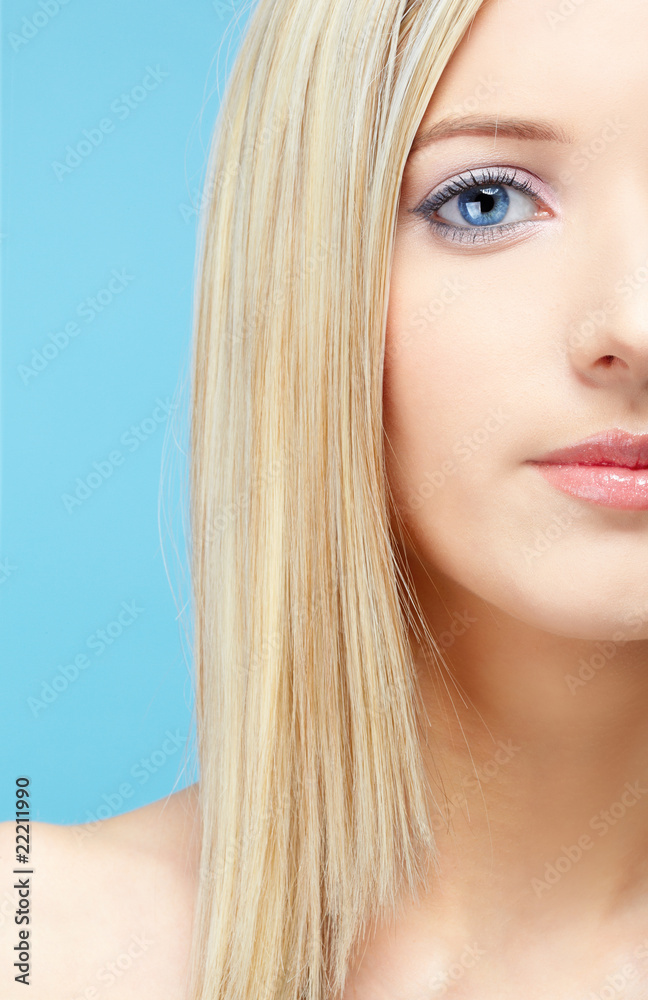 Fototapeta premium blonde girl's half-face portrait