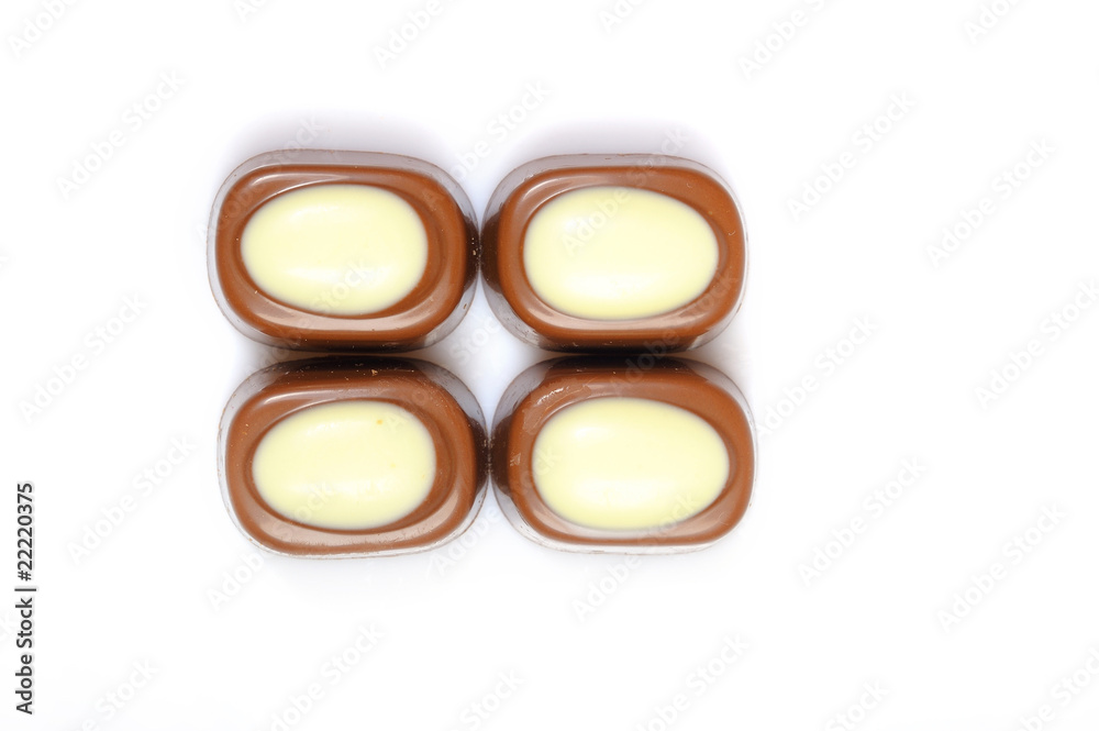 Delicious background of swiss dark and milk chocolates Delicious background of swiss dark and milk chocolates