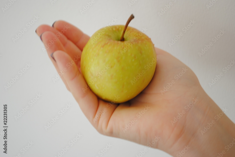 hand and apple hand and apple