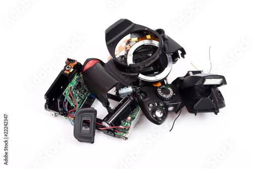 Broken and disassembled DSLR photocamera