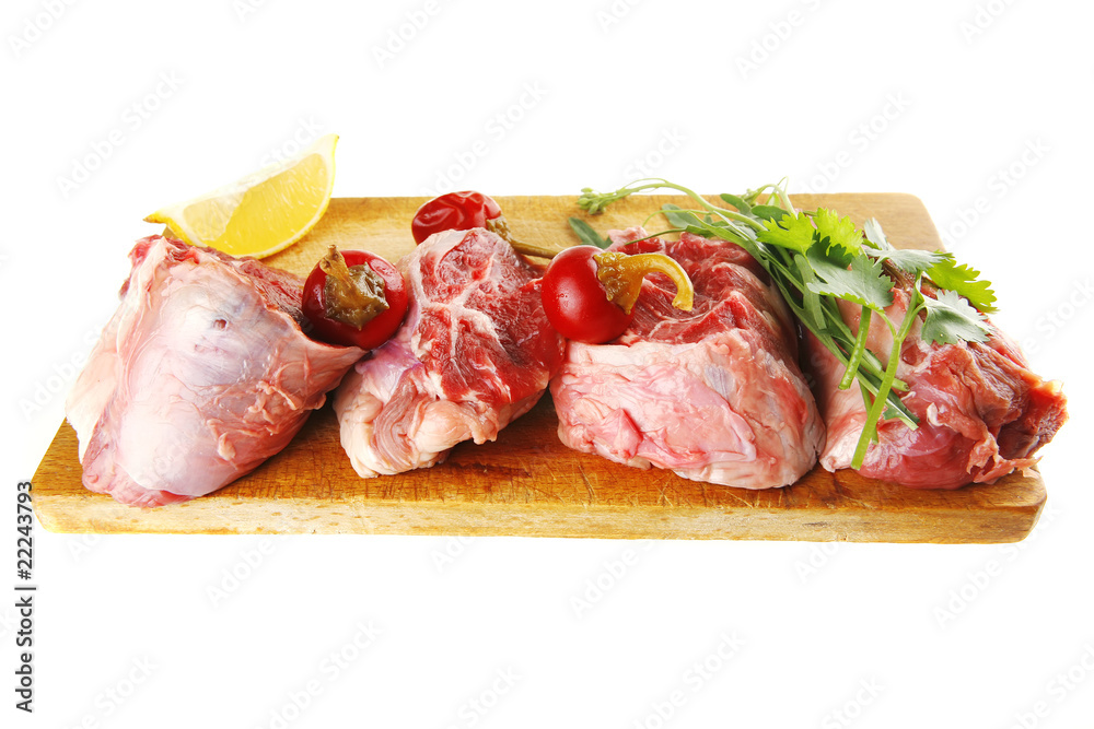 Fototapeta premium raw meat chunk on wood
