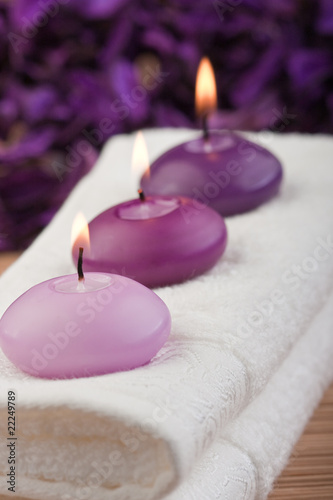 purple candles on massage towel  2 