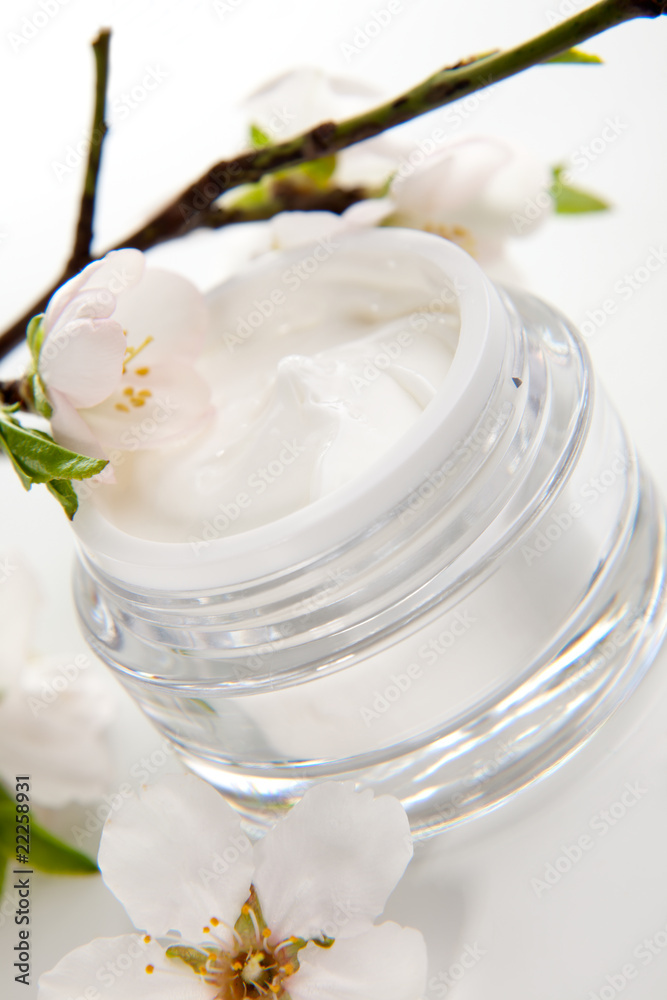 Face cream and almond flowers Face cream and almond flowers
