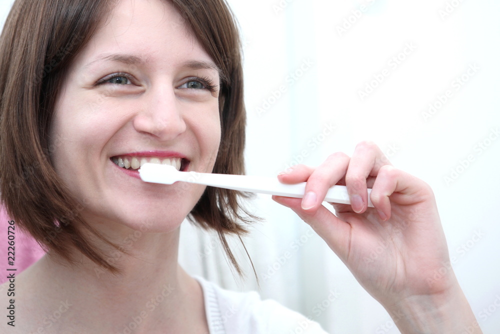 beautiful happy young woman brushing teeth beautiful happy young woman brushing teeth