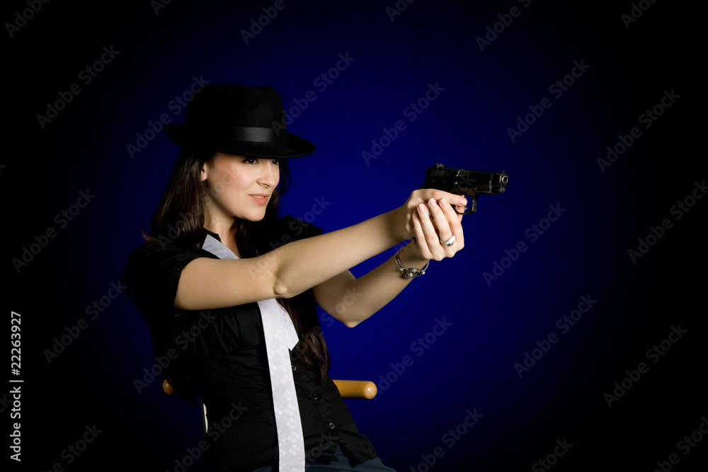 Fototapeta premium Prettty woman with gun