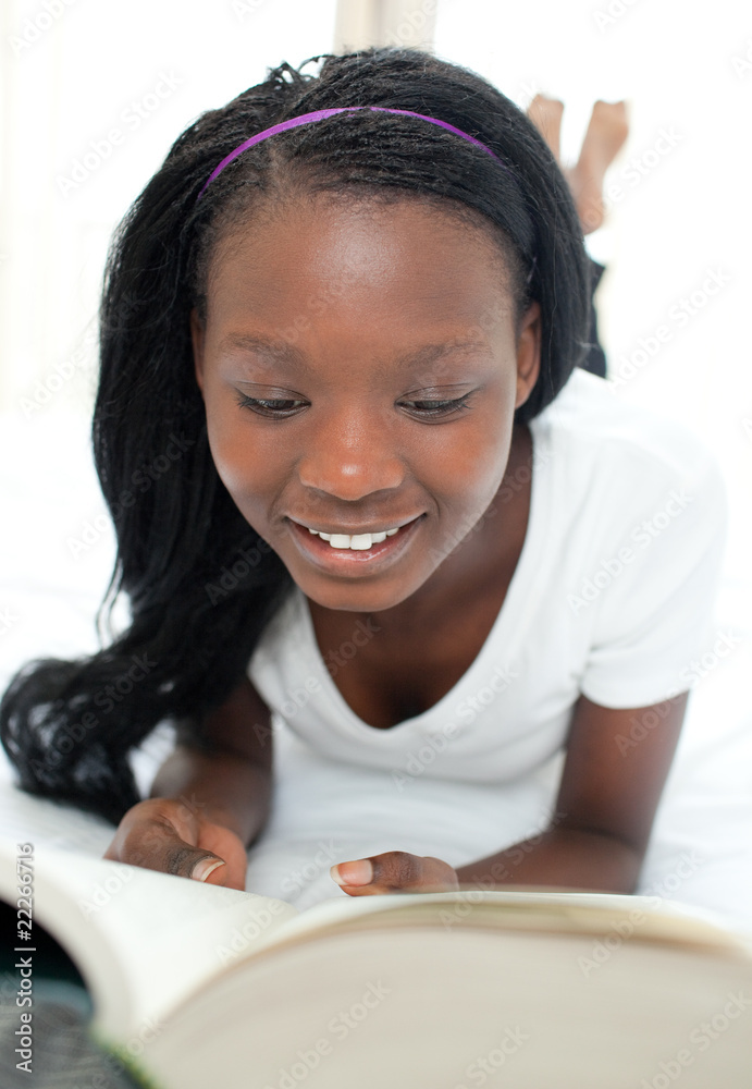 Smiling student doing her homework Smiling student doing her homework