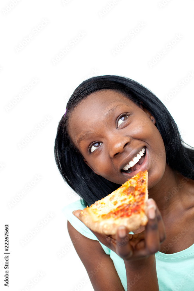 Cheerful woman eating a pizza