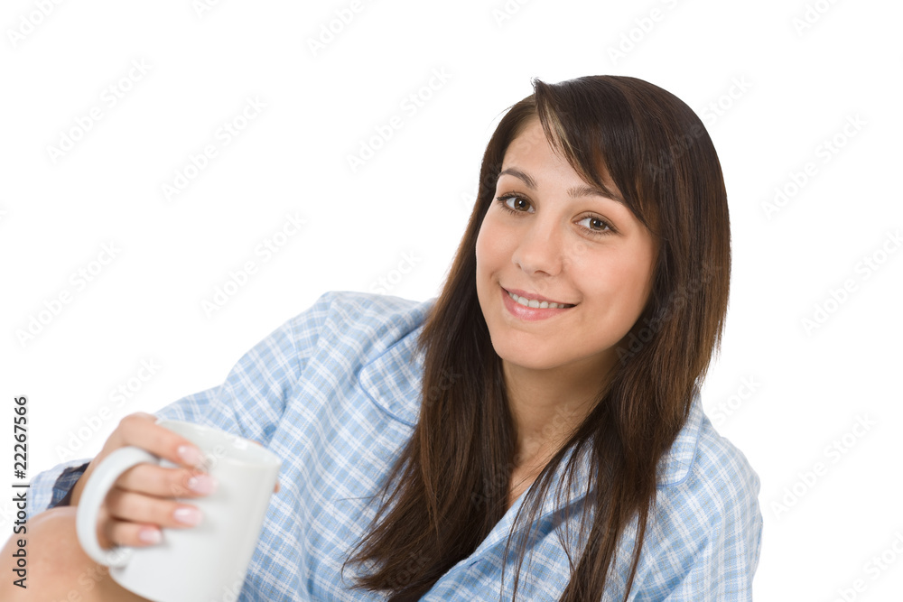 Happy young woman with coffee in pajamas Happy young woman with coffee in pajamas