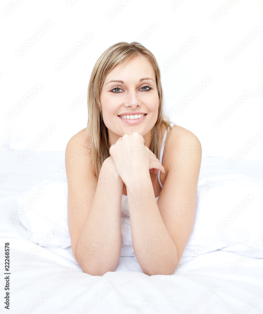 Portrait of a beautiful woman sitting oon her bed Portrait of a beautiful woman sitting oon her bed