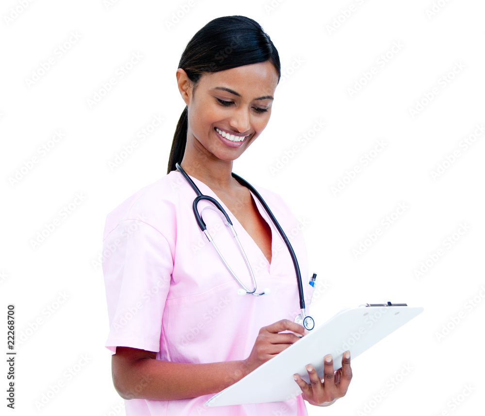 Radiant female doctor making notes in a patient's folder Radiant female doctor making notes in a patient's folder
