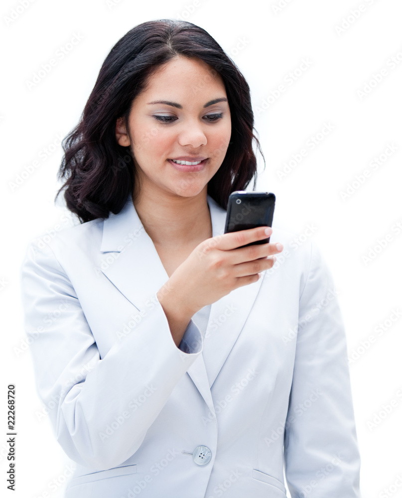 Portrait of an ethnic businesswoman sending a text Portrait of an ethnic businesswoman sending a text