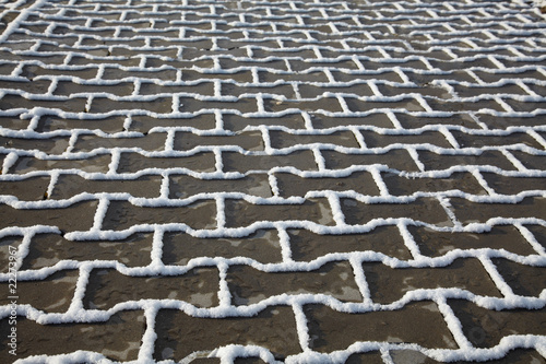 Snow texture on paving slab photo