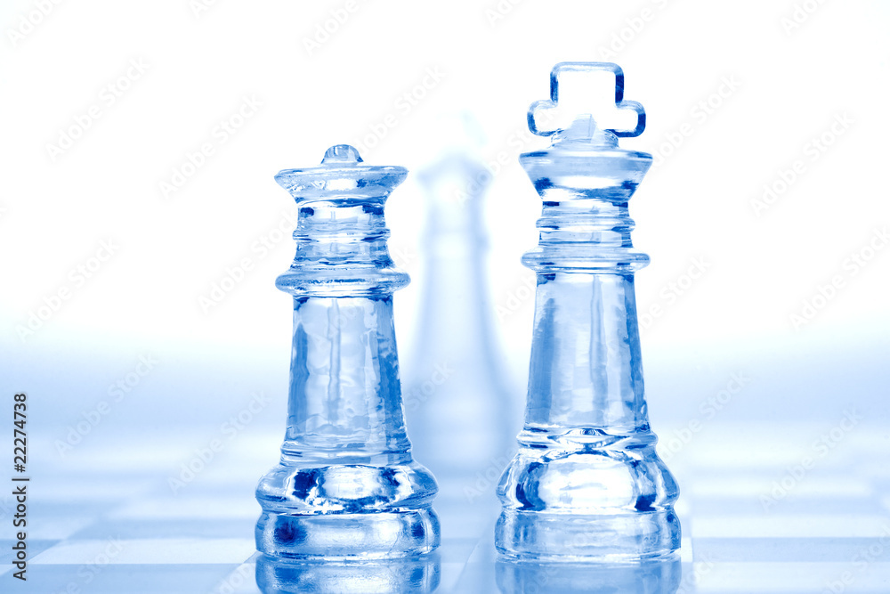glass chess pieces with blue light glass chess pieces with blue light