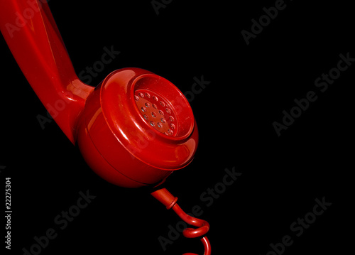 Telephone receiver on black background