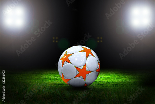 Soccer ball on the field of stadium with light